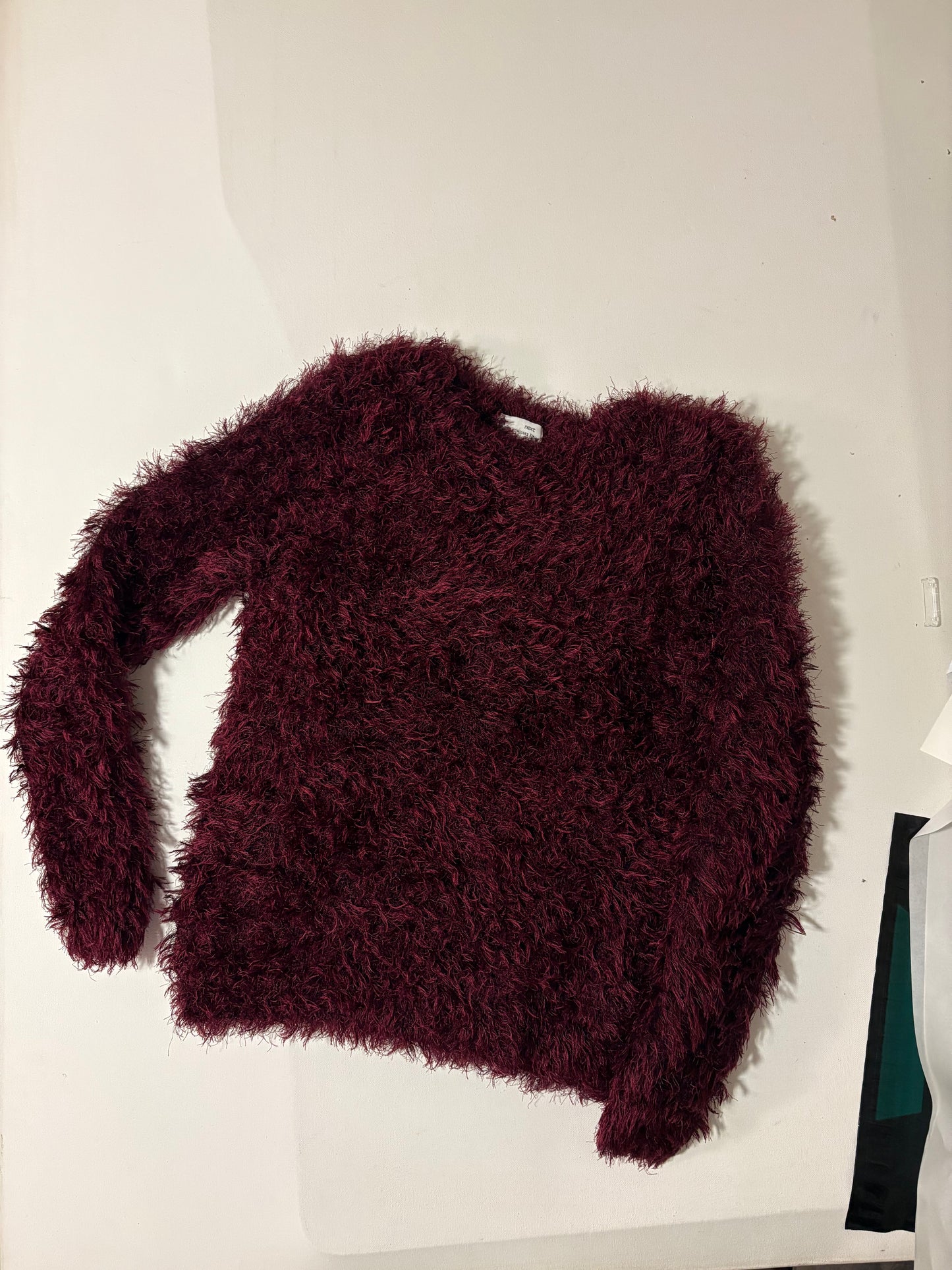 Next (burgundy)